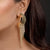 Illume Golden Arc Cascade Earrings